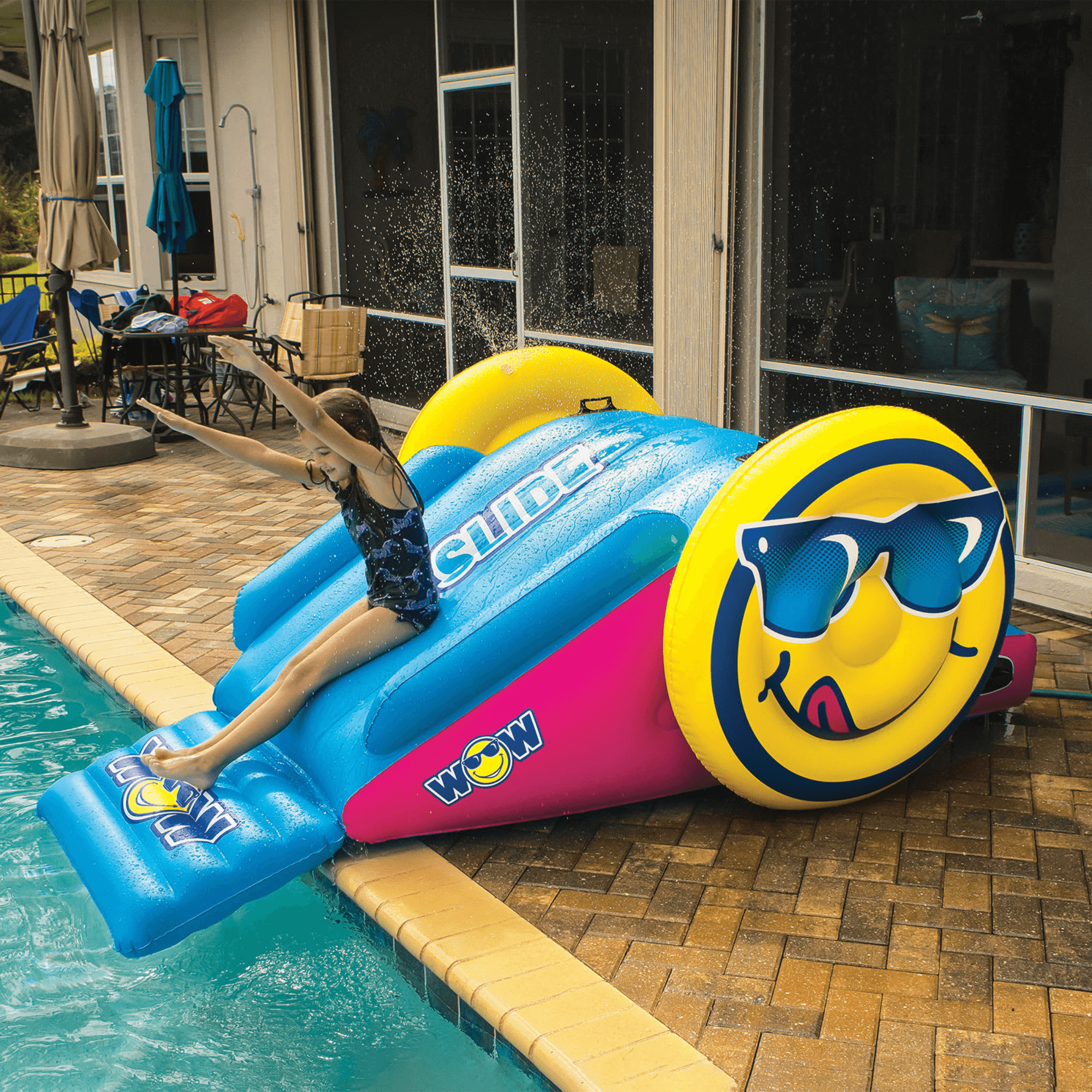 WOW Watersports Fun Inflatable Water Slide with Sprinklers for In-Ground Pools Jupiter Gear Home