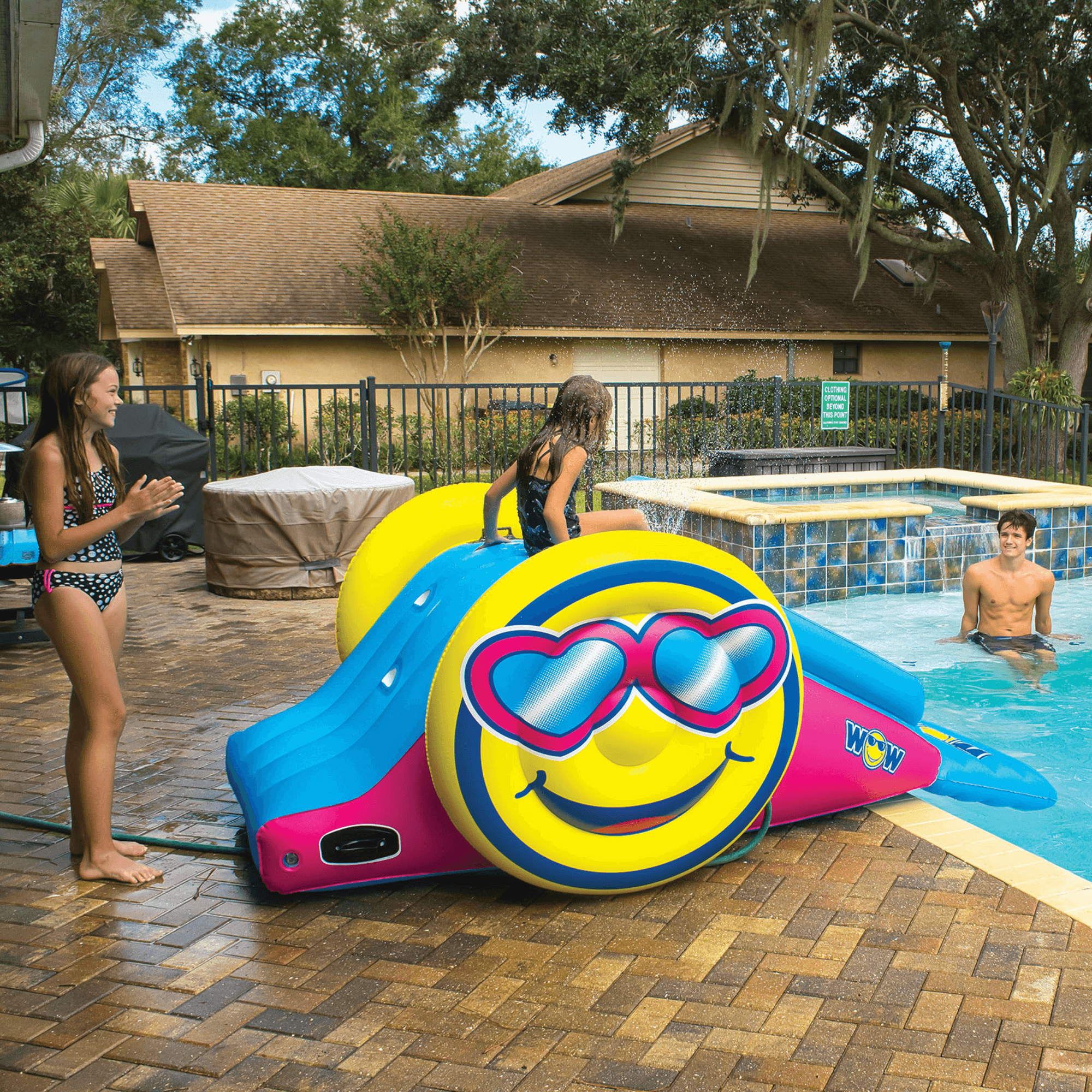 WOW Watersports Fun Inflatable Water Slide with Sprinklers for In-Ground Pools Jupiter Gear Home