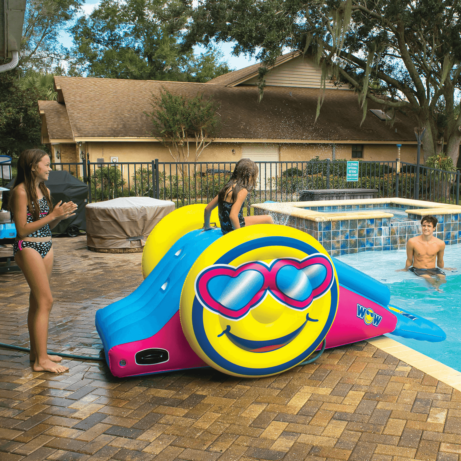 WOW Watersports Fun Inflatable Water Slide with Sprinklers for In-Ground Pools Jupiter Gear Home