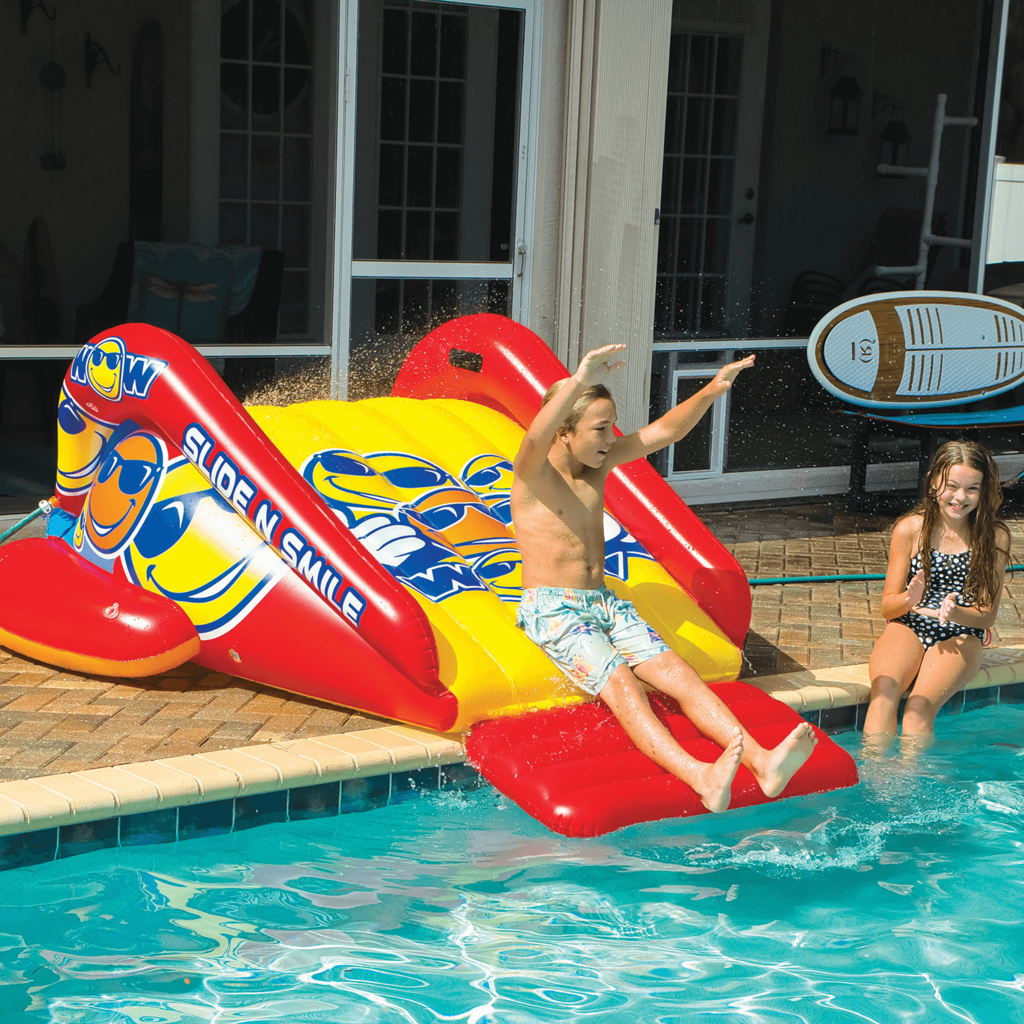 WOW Watersports Slide N Smile Inflatable Pool Slide with Sprinklers Jupiter Gear Home