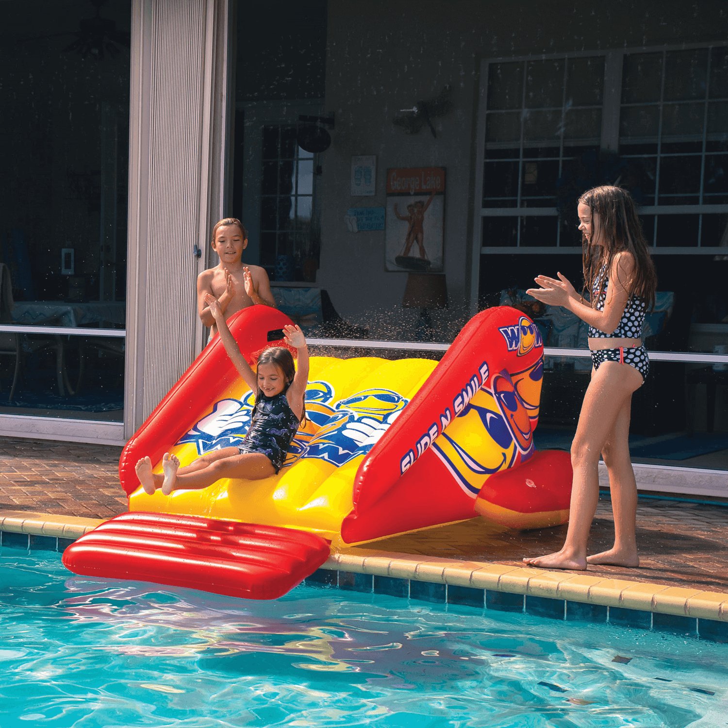 WOW Watersports Slide N Smile Inflatable Pool Slide with Sprinklers Jupiter Gear Home