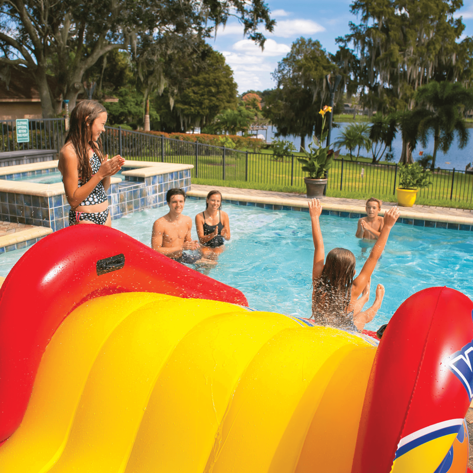 WOW Watersports Slide N Smile Inflatable Pool Slide with Sprinklers Jupiter Gear Home