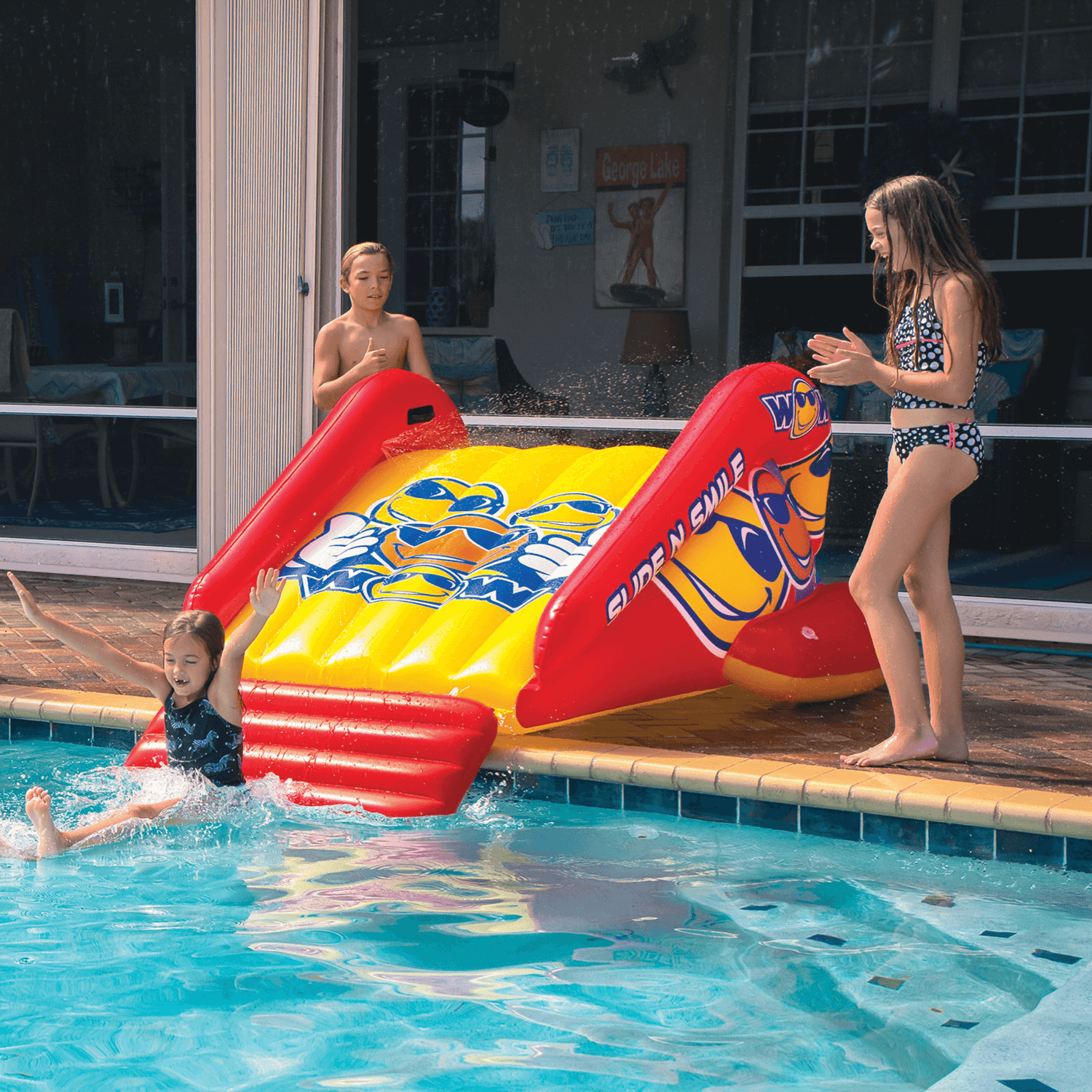 WOW Watersports Slide N Smile Inflatable Pool Slide with Sprinklers Jupiter Gear Home