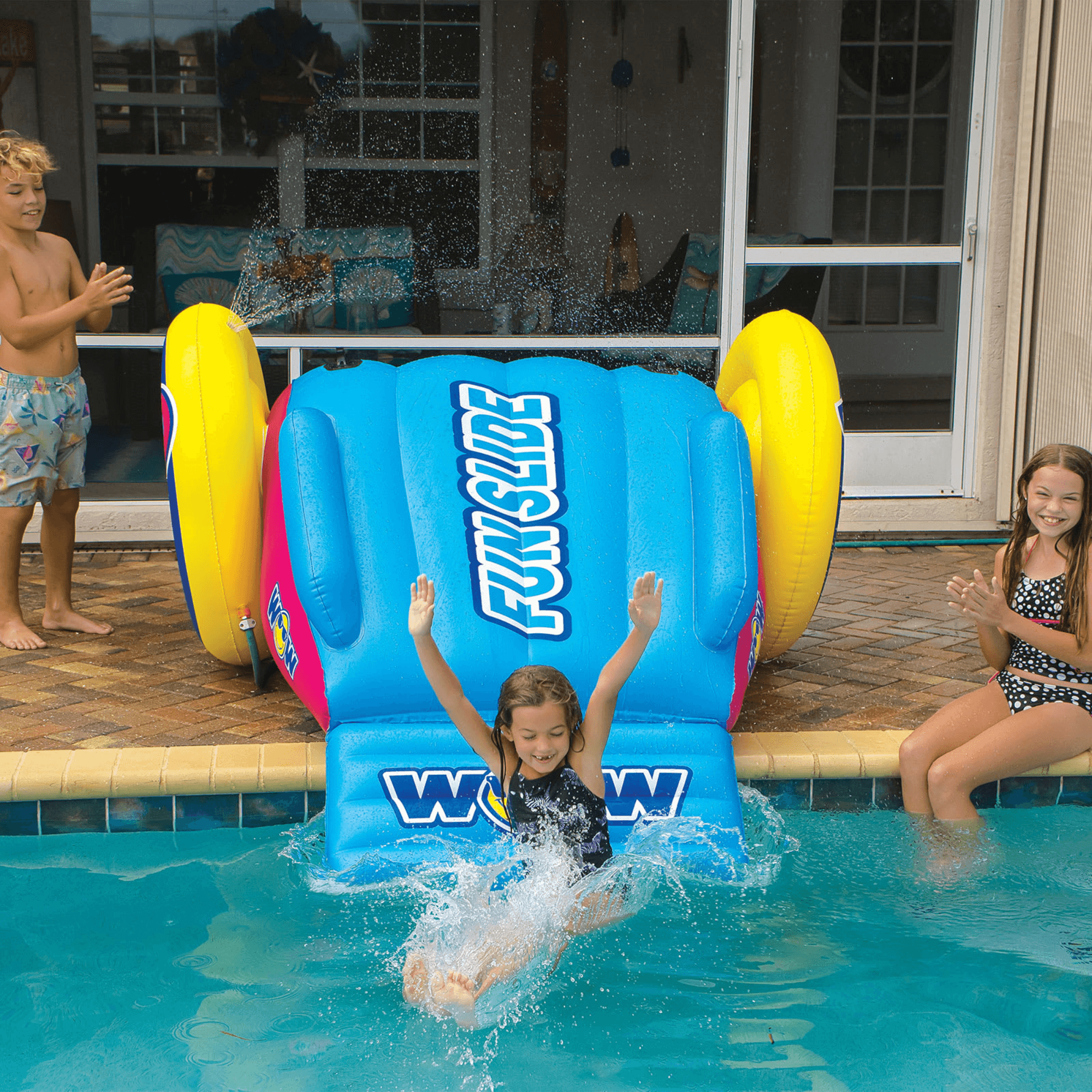 WOW Watersports Fun Inflatable Water Slide with Sprinklers for In-Ground Pools Jupiter Gear Home